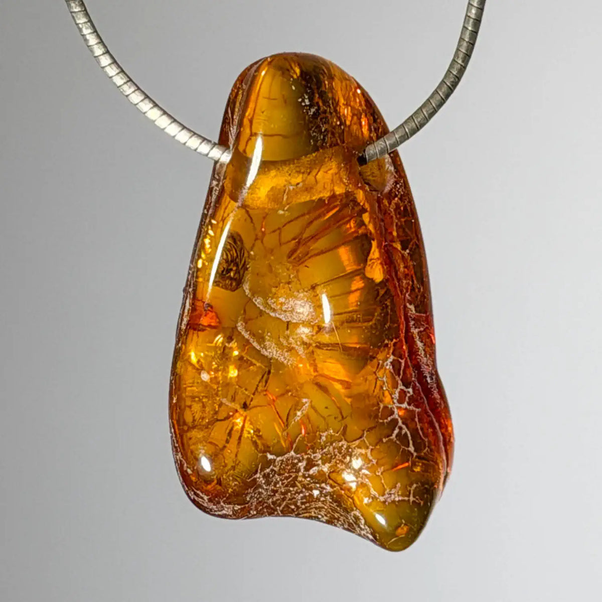 bernstein-edelstein-schmuck-ketten-anhaenger-heilstein-241026