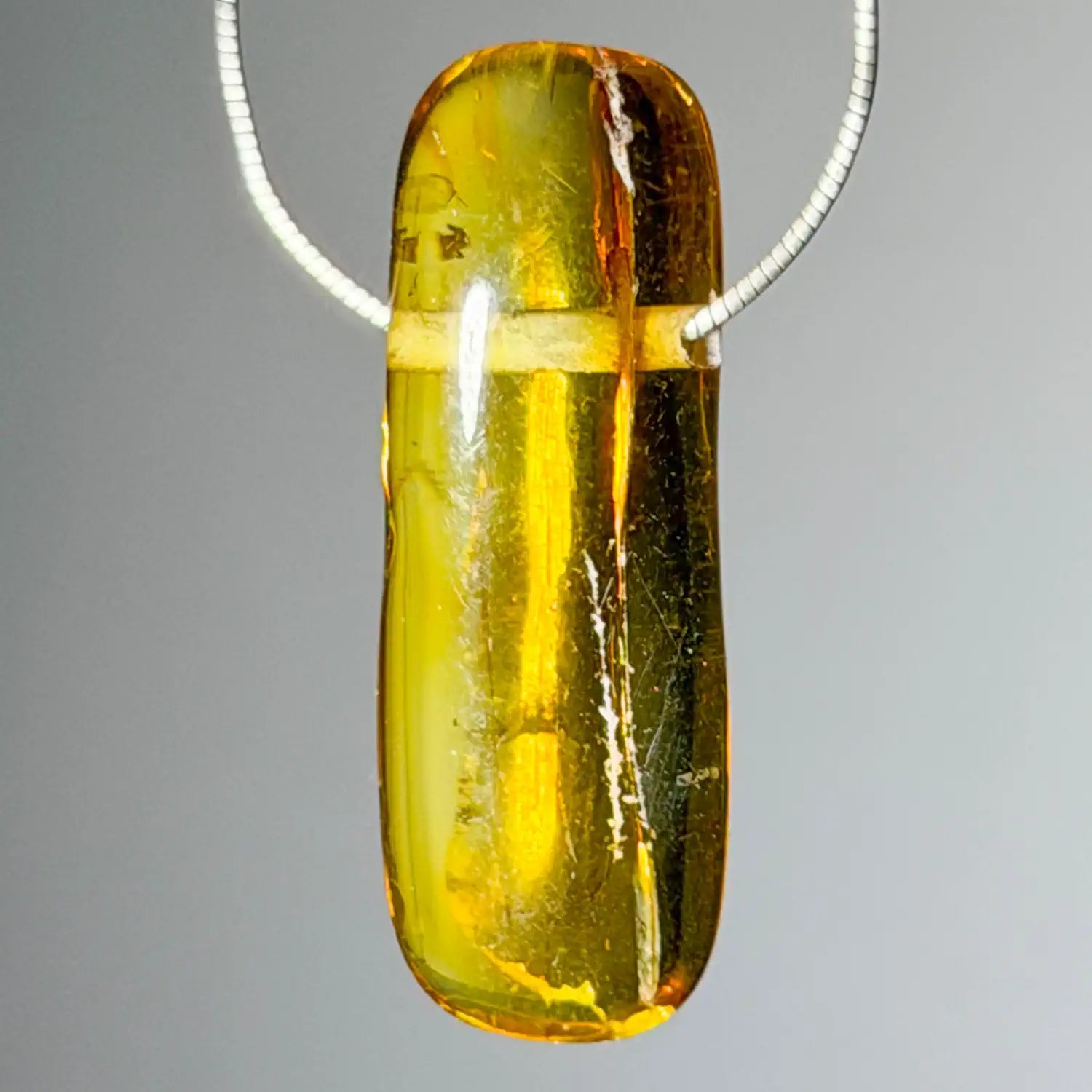 bernstein-edelstein-trommelstein-schmuck-ketten-anhaenger-heilstein-010726