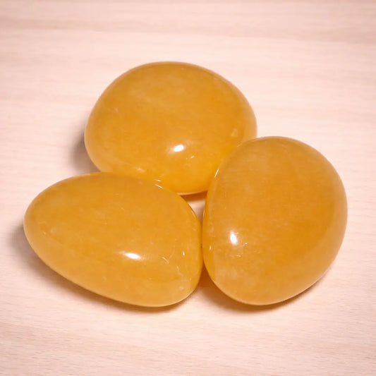 orangencalcit-edelstein-trommelstein-handschmeichler-entspannung-massage-chakra-seelensteinchen