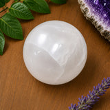 Selenit Kugel ca. 80mm incl Schungit Untersetzer - Edelstein - Handschmeichler A Qualität #6852