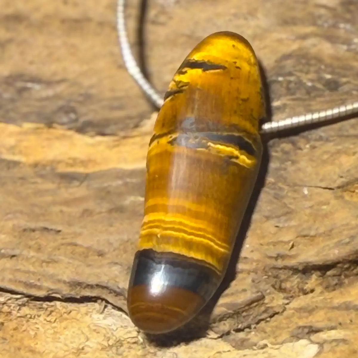tigerauge-edelstein-schmuck-ketten-anhaenger-collier-trommelstein-seelensteinchen-130826